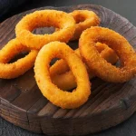 Come preparare gli anelli di calamari croccanti in pastella: ricetta passo passo come-preparare-gli-anelli-di-calamari-croccanti-in-pastella-ricetta.webp.webp